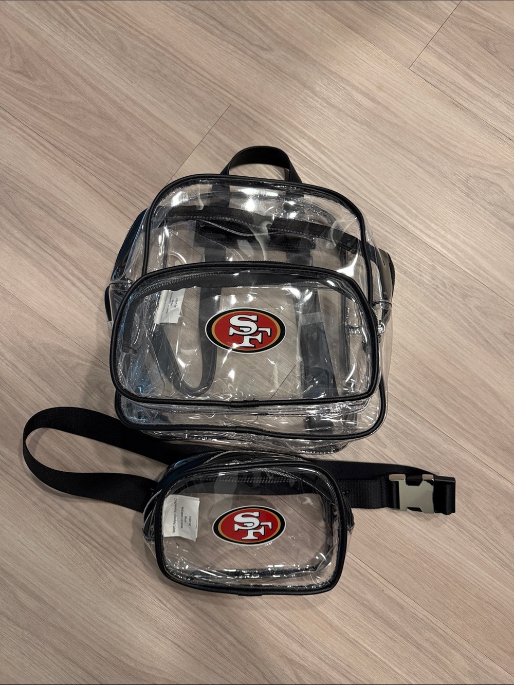 Clear Black-Trim Backpack and Waist Pack with Red Logo